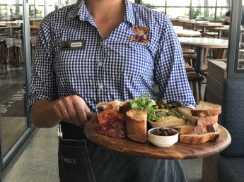 Pig 'N' Whistle Redbank Plains - 2018-01 - New Menu - Staff with Ploughman's Platter